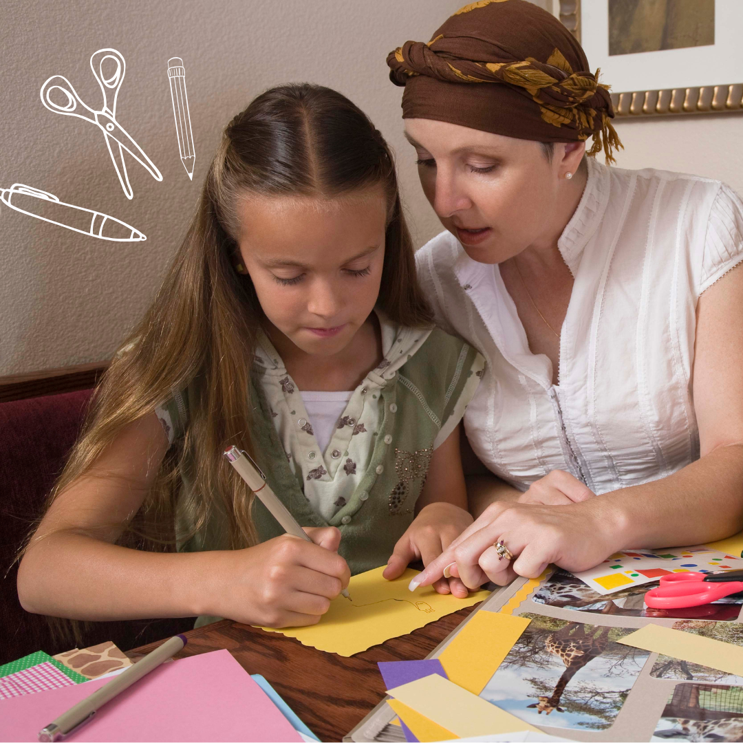 A child and adult drawing with craft materials on a table